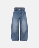 Baggy jeans with Paris-style buckle waist detail