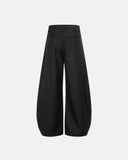 black relaxed tailored pants minimalist silhouette