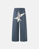 oversized sweatpants with star patch graphic