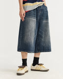 washed black baggy denim jorts front view